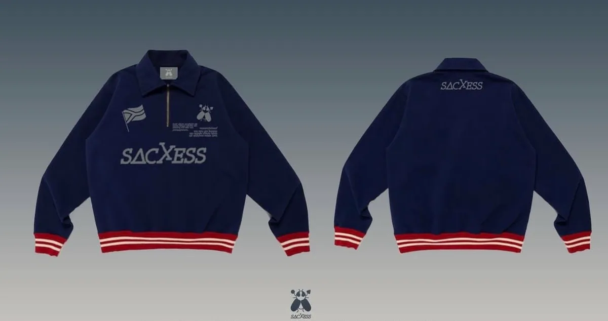 Quarter-Zip in navy with red and cream varsity hem, front and back